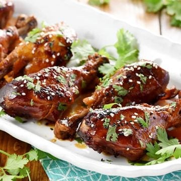 Slow Cooker Sweet Chili Drumsticks ~ this chicken recipe starts with a simple marinade of soy sauce, Thai sweet chili sauce, and ginger, then slow cooks until tender for an effortless, sweet-and-savory, Asian dinner that's healthier and more economical than take-out! | FiveHeartHome.com