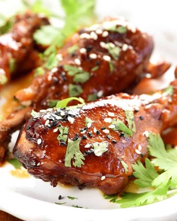 Slow Cooker Sweet Chili Drumsticks ~ this chicken recipe starts with a simple marinade of soy sauce, Thai sweet chili sauce, and ginger, then slow cooks until tender for an effortless, sweet-and-savory, Asian dinner that's healthier and more economical than take-out! | FiveHeartHome.com