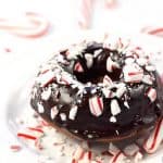 Chocolate Peppermint Baked Donuts ~ a decadent holiday breakfast or dessert, these baked donuts are soft and tender, with a rich chocolate glaze and crushed candy canes sprinkled on top! | FiveHeartHome.com