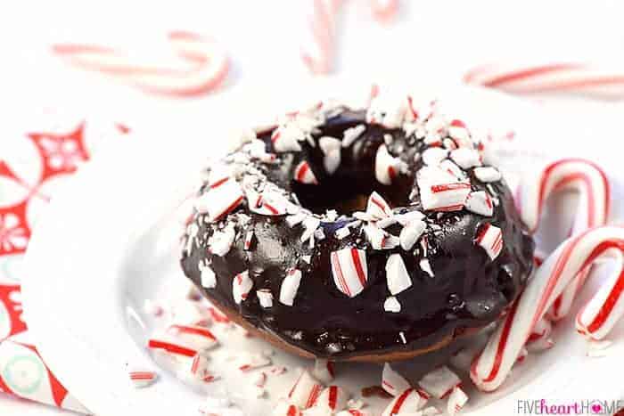 Chocolate Peppermint Baked Donuts ~ a decadent holiday breakfast or dessert, these baked donuts are soft and tender, with a rich chocolate glaze and crushed candy canes sprinkled on top! | FiveHeartHome.com