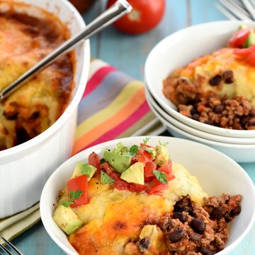 Taco Shepherd's Pie ~ a comfort food classic gets a Tex-Mex twist with taco-seasoned, salsa-spiced ground beef, studded with black beans and topped with cheesy green chile mashed potatoes! | FiveHeartHome.com
