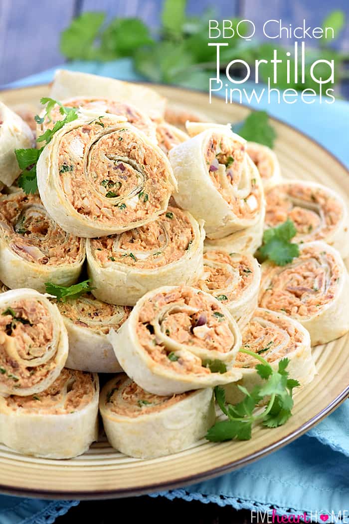 BBQ Chicken Tortilla Pinwheels ~ soft flour tortillas are slathered with a mixture of cream cheese, mozzarella, chicken, bacon, barbecue sauce, red onion, and cilantro, then rolled up tight and sliced in this flavorful, addictive appetizer recipe that's perfect for parties, potlucks, picnics, or game day! | FiveHeartHome.com BBQ Chicken Tortilla Pinwheels with text overlay.