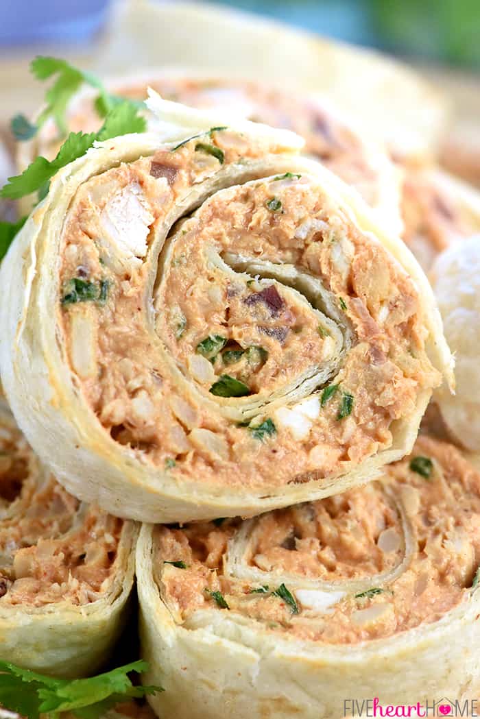 BBQ Chicken Tortilla Pinwheels ~ soft flour tortillas are slathered with a mixture of cream cheese, mozzarella, chicken, bacon, barbecue sauce, red onion, and cilantro, then rolled up tight and sliced in this flavorful, addictive appetizer recipe that's perfect for parties, potlucks, picnics, or game day! | FiveHeartHome.com Close-up.