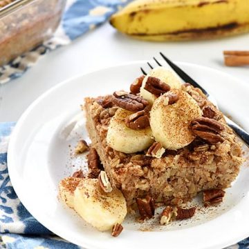 Banana Baked Oatmeal scene with dish and ingredients in background.