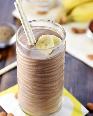 Chocolate Banana Smootie with ingredients in background