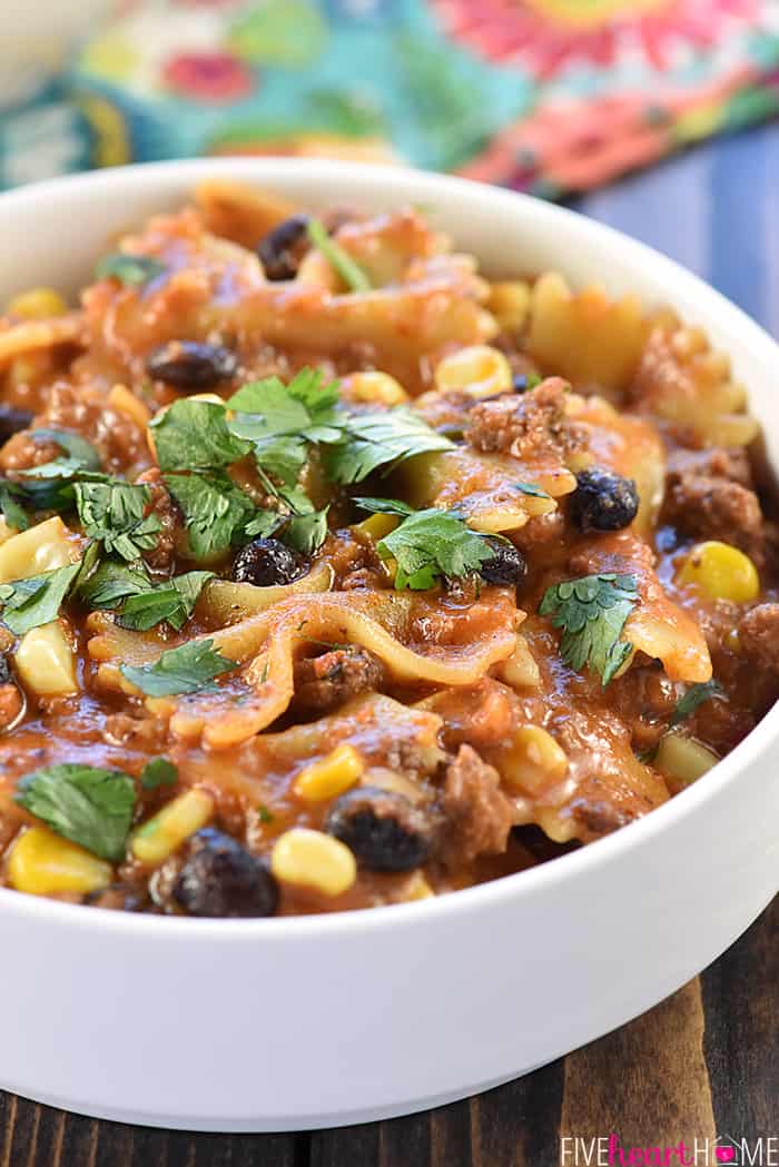 Taco Pasta in serving bowl garnished with cilantro.