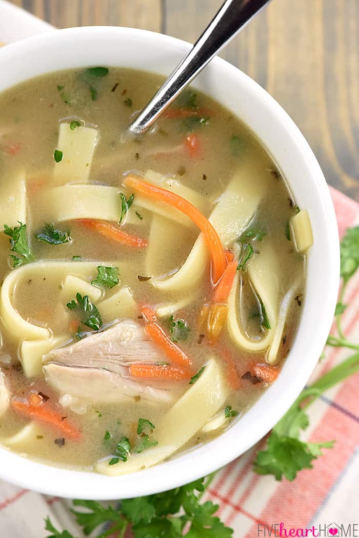 Aerial zoom view of bowl of Easy Chicken Noodle Soup.