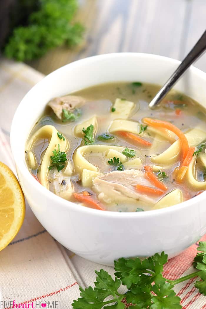 Quick & Easy Homemade Chicken Noodle Soup ~ a delicious, nourishing, cold-buster recipe for getting well soon! | FiveHeartHome.com Bowl of Easy Chicken Noodle Soup with spoon.