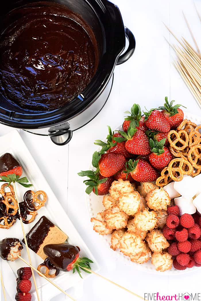 Chocolate Fondue with fruit, pretzels and marshmallows for dipping.