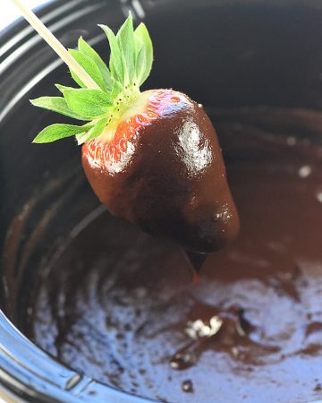 Slow Cooker Chocolate Peanut Butter Fondue ~ a decadent, glossy, chocolate dessert recipe kissed with peanut butter, the perfect crock pot dip for your favorite fruit and confections on Valentine's Day or any day! | FiveHeartHome.com