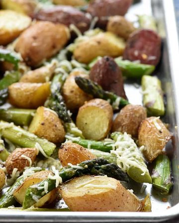 Cheesy Garlic Roasted Potatoes & Asparagus ~ an easy, one-pan, spring side dish recipe that makes a gorgeous, delicious addition to a special Easter meal or a regular weeknight dinner! | FiveHeartHome.com