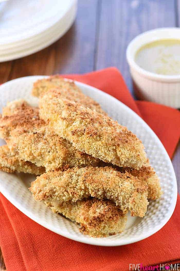 Crunchy Baked Chicken Tenders on a White Platter