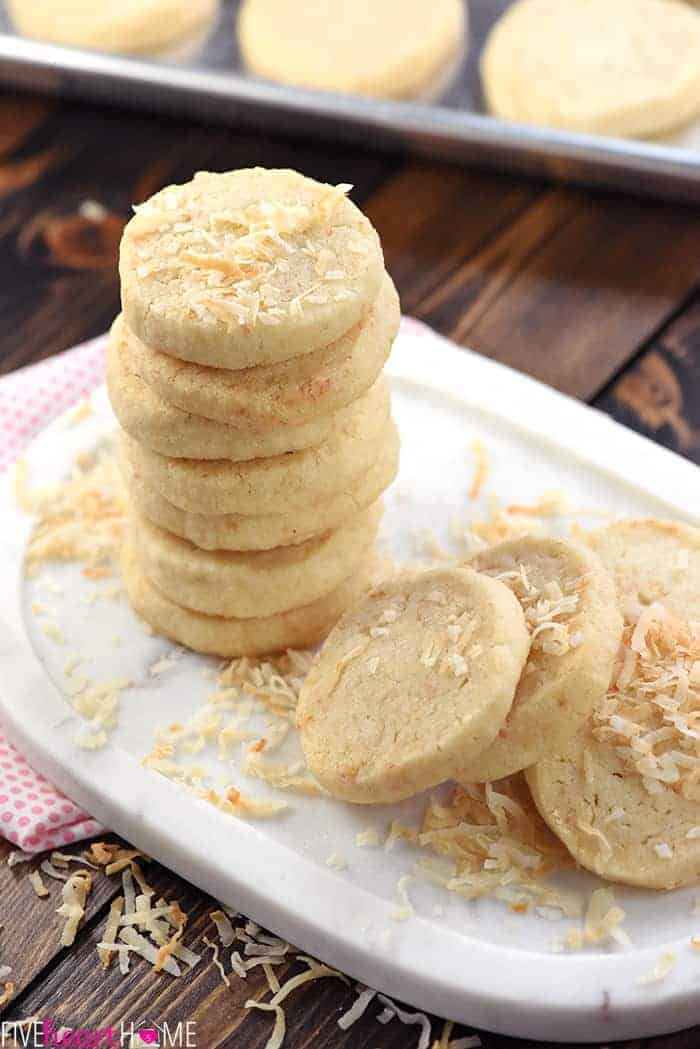 Easy Coconut Shortbread Cookies Stacked on Serving Dish