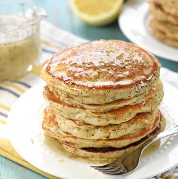 Whole Wheat Lemon Poppy Seed Pancakes ~ wholesome and delicious pancakes drizzled with a scrumptious Lemon Poppy Seed Syrup make a lovely spring or summer breakfast! | FiveHeartHome.com