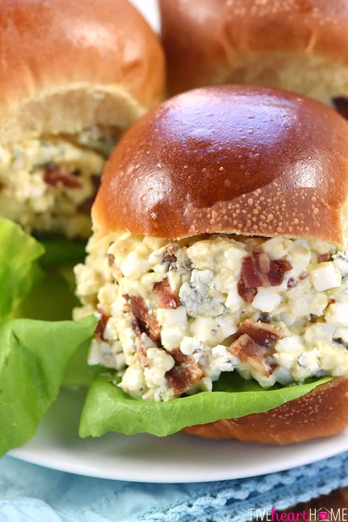 Egg Salad with Bacon and Blue Cheese ~ a flavorful filling for sandwiches or lettuce wraps, and a great recipe for using up leftover hard-boiled Easter eggs! | FiveHeartHome.com Close-up of Egg Salad with Bacon sandwich