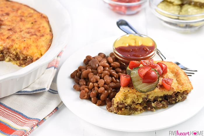 Serving of Cheeseburger Pie without Bisquick with garnishes.