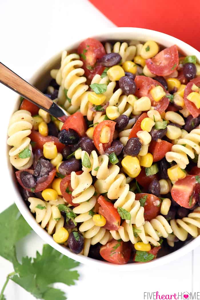 Aerial View of Mexican Pasta Salad in bowl with spoon.