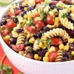 Fiesta Pasta Salad ~ loaded with corn, black beans, tomatoes, jalapeño, cilantro, and a fresh lime vinaigrette for a zesty, flavorful, summer side dish! | FiveHeartHome.com