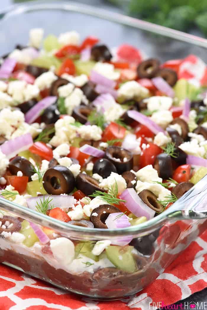 Greek 7-Layer Dip in glass dish.