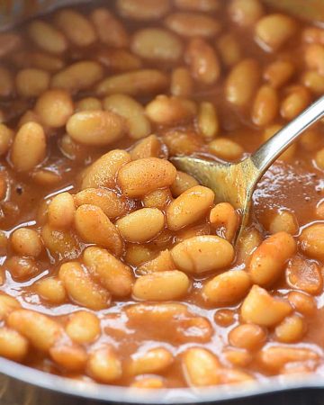 Quick Stovetop Baked Beans ~ a quick and easy, 5-ingredient recipe that dresses up canned white beans for a versatile dinnertime side dish! | FiveHeartHome.com