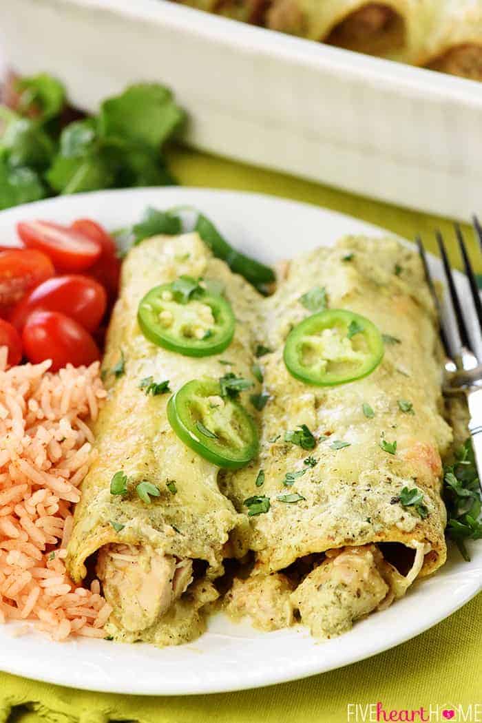 Creamy Jalapeño Chicken Enchiladas Served on White Plate with Sides