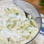 Creamy German Cucumber Salad, AKA Gurkensalat ~ a fresh and simple side dish featuring thinly sliced cucumbers in a sour cream and dill dressing! | FiveHeartHome.com