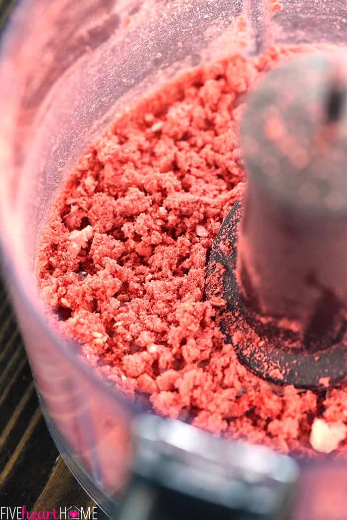 Freeze-dried strawberries in pulsed into a powder in food processor 