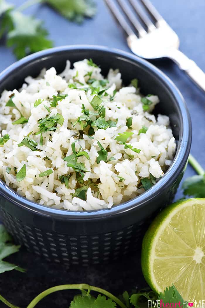 Cilantro Lime Rice in black bowl with fork.