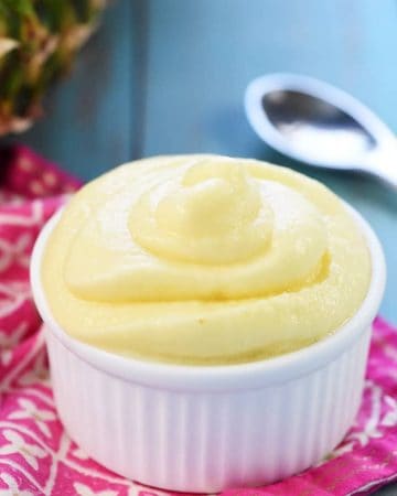 Healthy Copycat Dole Whip ~ made with just two ingredients, this frozen treat tastes like pineapple soft serve ice cream for an improved version of the Disney classic! | FiveHeartHome.com
