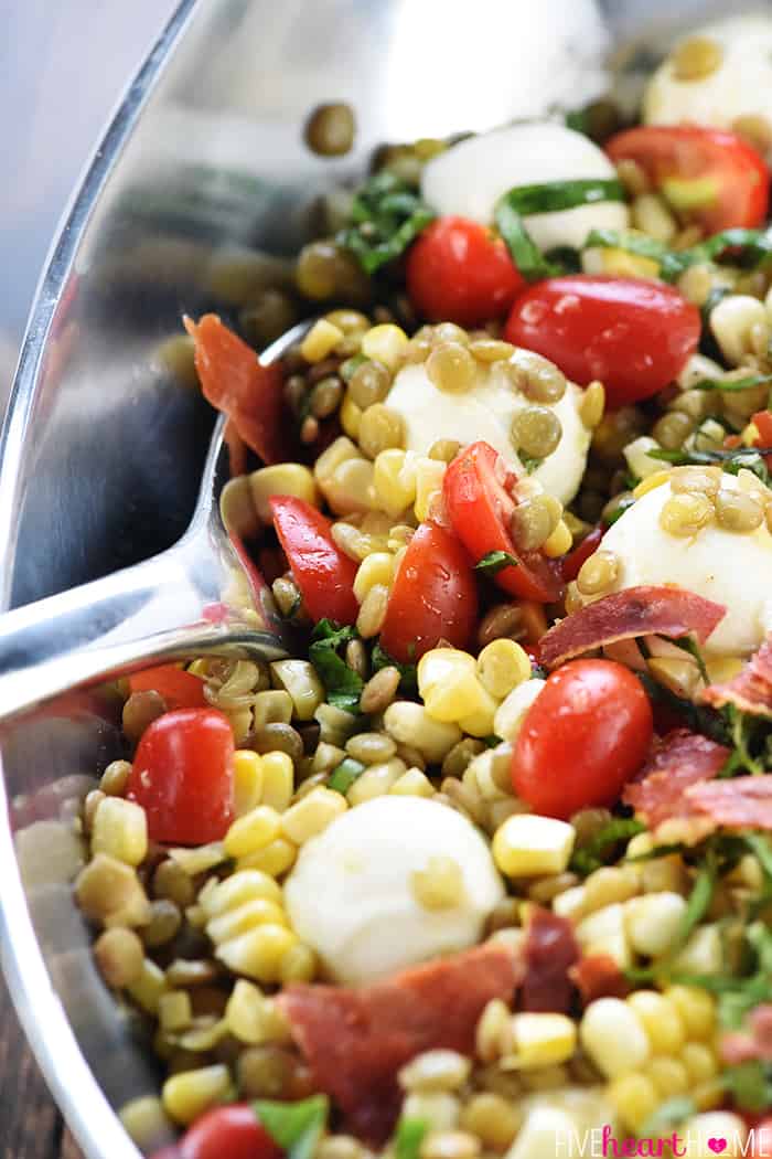 Summer Lentil Salad ~ loaded with protein-packed lentils, roasted corn, juicy tomatoes, creamy mozzarella, fresh basil, and crispy prosciutto for a healthy, vibrant main dish or a versatile side! | FiveHeartHome.com