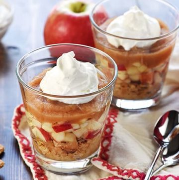 Healthy Apple Pie Snack Cups ~ layers of graham cracker crumbs, diced apples, cinnamon applesauce, and whipped cream make a wholesome after-school snack or dessert that tastes just like apple pie! | FiveHeartHome.com