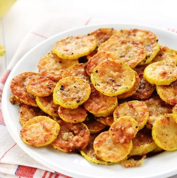 Baked Parmesan Yellow Squash Rounds Recipe ~ an easy and delicious summer side dish requiring just two ingredients: yellow squash and grated Parmesan! | FiveHeartHome.com