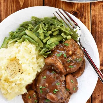 Easy Beef Patties with Mushroom Gravy ~ these mini Salisbury steaks in a rich, savory, gravy loaded with fresh mushrooms are a classic, comforting, ground beef dinner recipe! | FiveHeartHome.com