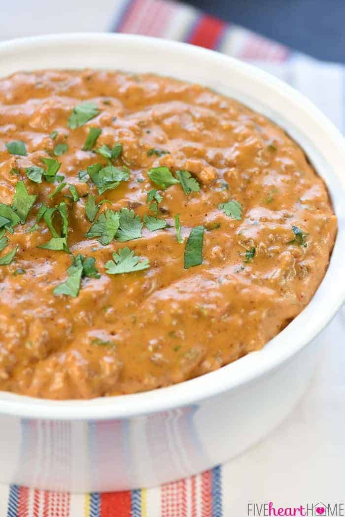 Close-up of Hot Taco Dip garnished with cilantro.