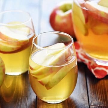 3-Ingredient Sparkling Apple Cider Sangria ~ a festive fall cocktail recipe made with white wine, apple cider, and sweet sliced Honeycrisps -- perfect for tailgating, Halloween, Thanksgiving, and even Christmas!