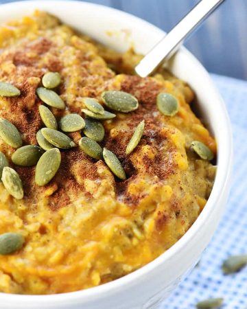 Quick & Easy Pumpkin Oatmeal ~ a healthy, yummy fall breakfast recipe loaded with pumpkin, almond butter, chia seeds, and cinnamon & spices, sweetened with a touch of maple syrup, and topped with roasted pumpkin seeds! | FiveHeartHome.com