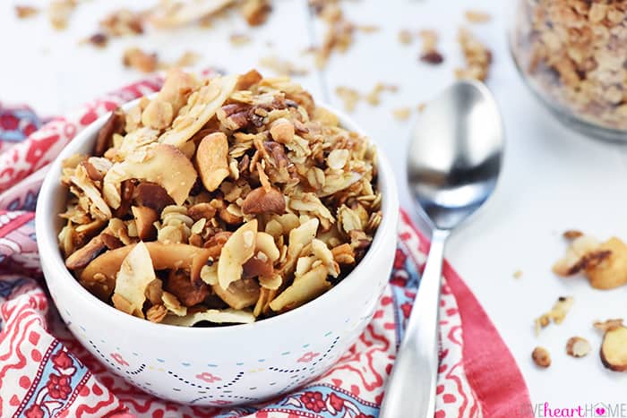 Slow Cooker Granola in bowl with spoon.