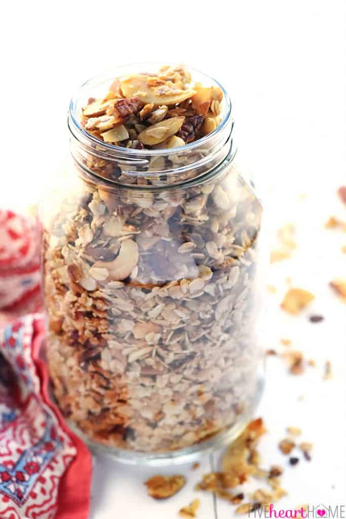 Slow Cooker Granola ~ a combination of oats, nuts, coconut, coconut oil, and honey effortlessly cook in the crock pot for a crunchy, wholesome breakfast or snack! | FiveHeartHome.com