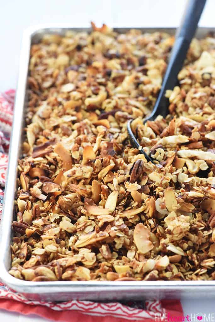 Slow Cooker Granola ~ a combination of oats, nuts, coconut, coconut oil, and honey effortlessly cook in the crock pot for a crunchy, wholesome breakfast or snack! | FiveHeartHome.com