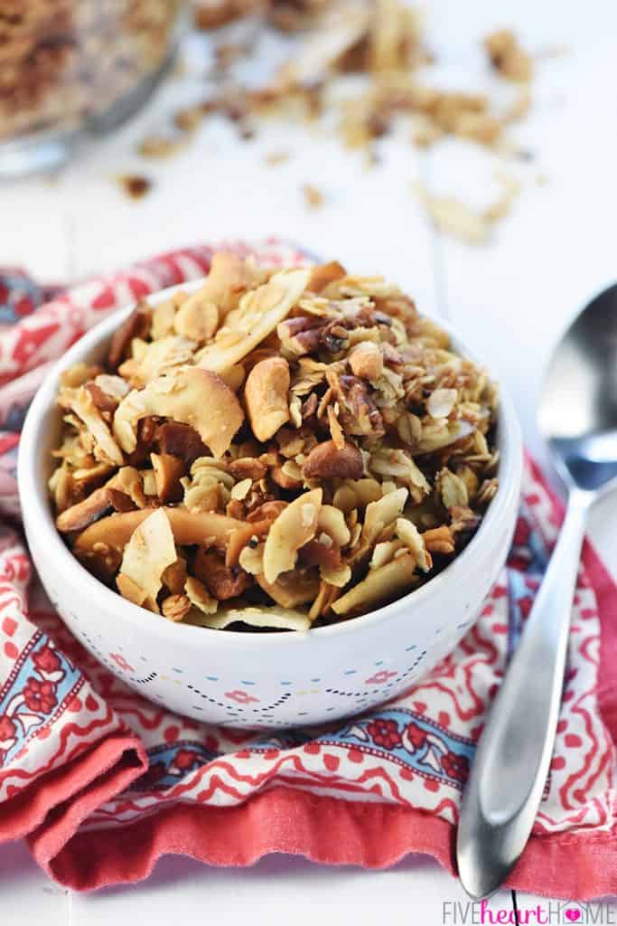 Slow Cooker Granola ~ a combination of oats, nuts, coconut, coconut oil, and honey effortlessly cook in the crock pot for a crunchy, wholesome breakfast or snack! | FiveHeartHome.com