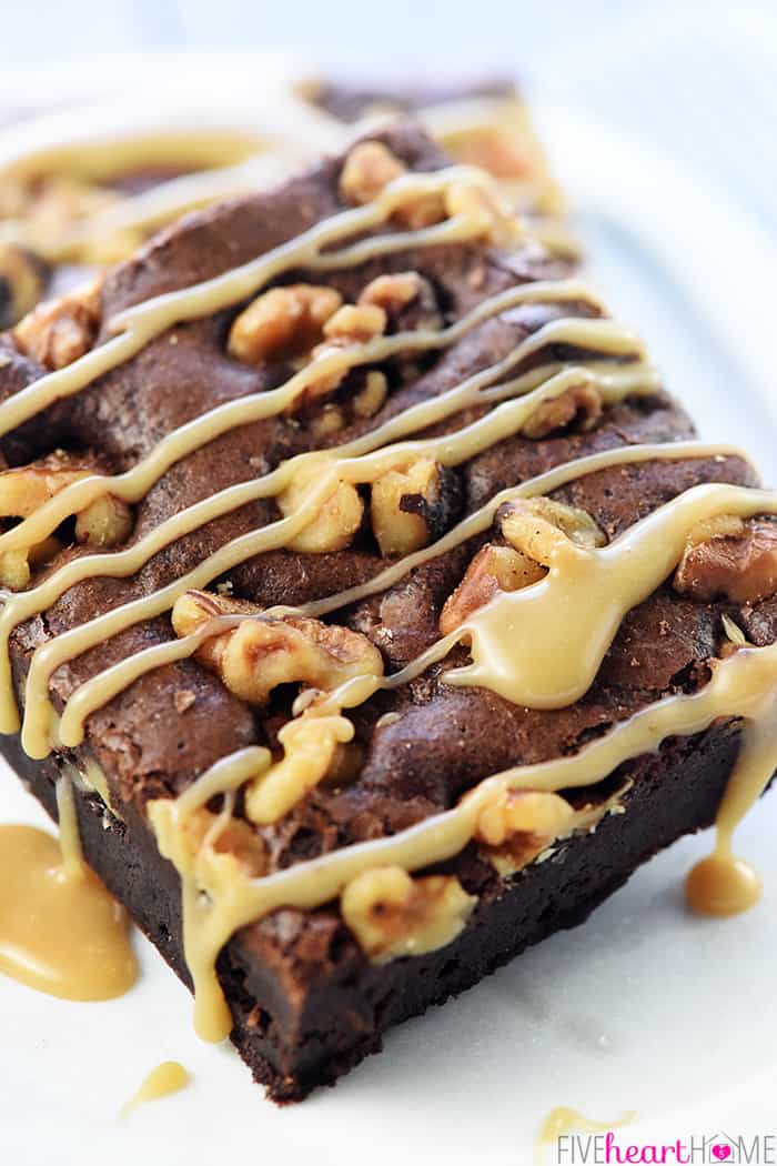 Close-up of brownie drizzled with caramel sauce.