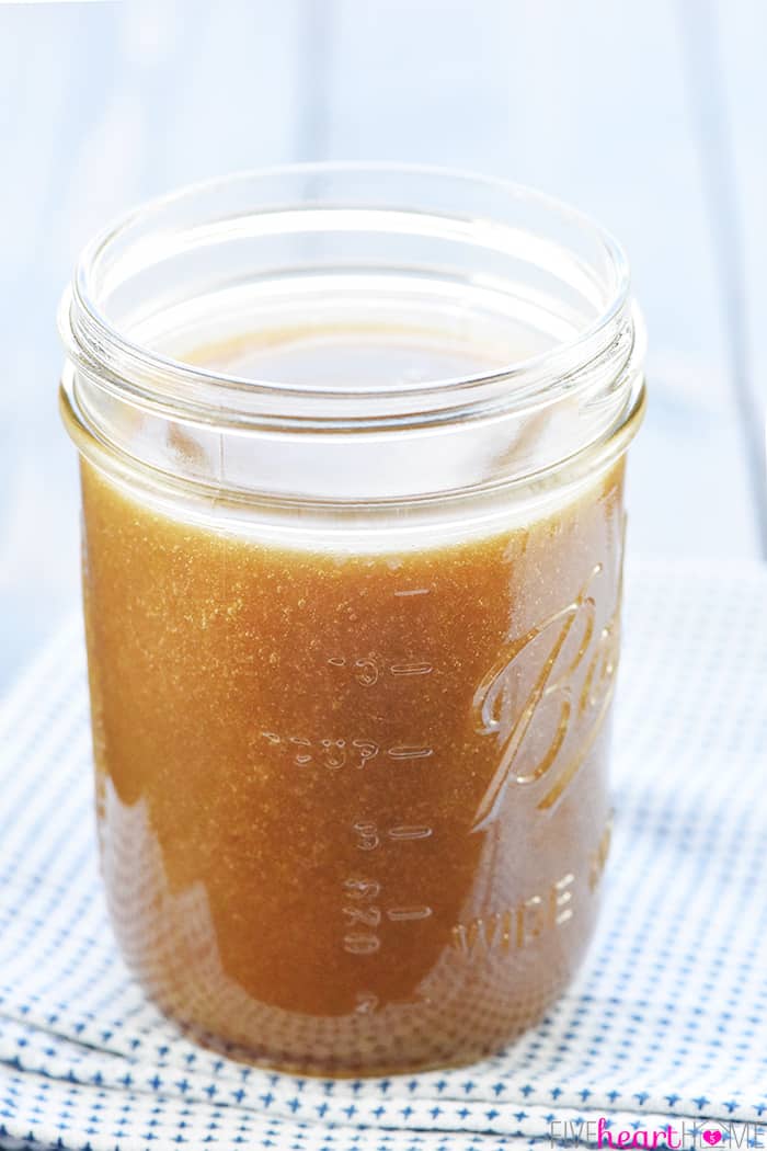 Caramel Sauce in a glass Mason jar.
