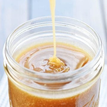 Caramel Sauce being poured into jar.