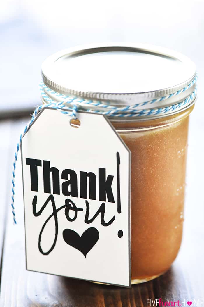 Homemade Caramel Sauce in a jar with a gift tag.