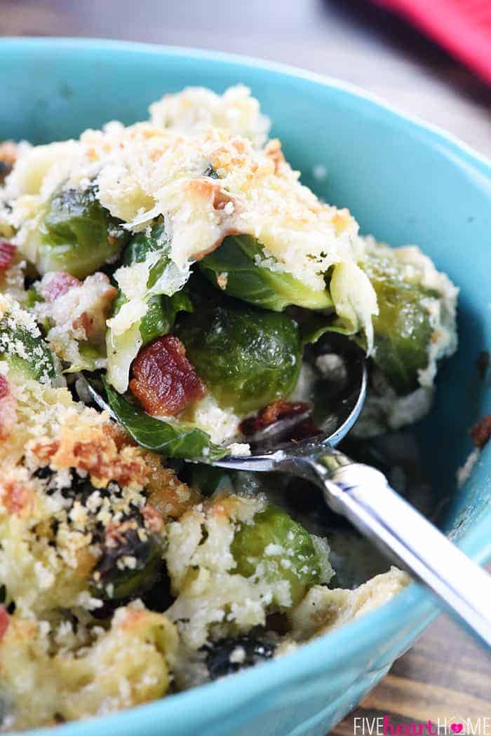 Zoom of spoonful of Brussels Sprouts with Bacon, topped with Gruyere and Panko.