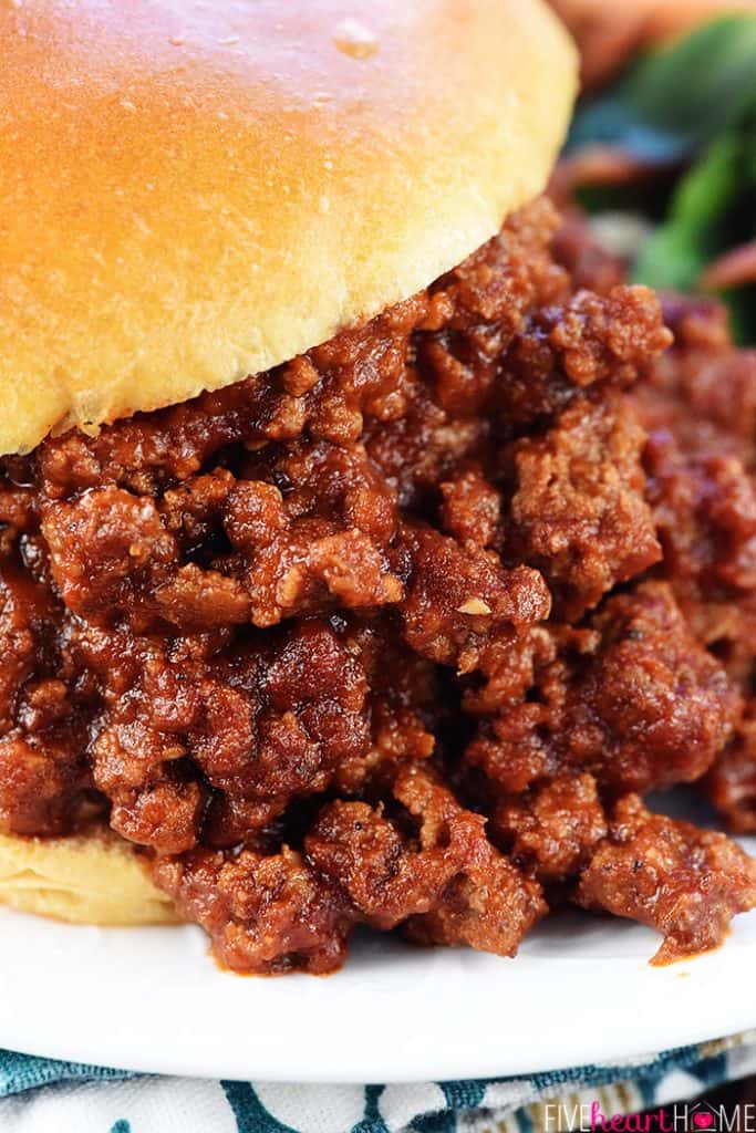 Close-up of Sloppy Joe Recipe on overflowing bun.