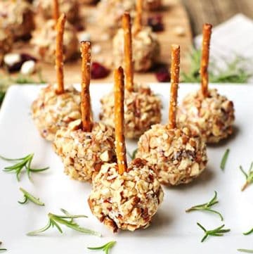 Mini Cheese Ball Bites ~ easy appetizer recipe featuring dried cranberries, blue cheese, toasted pecans, and pretzel skewers, perfect for the holidays or any party or get-together! | FiveHeartHome.com