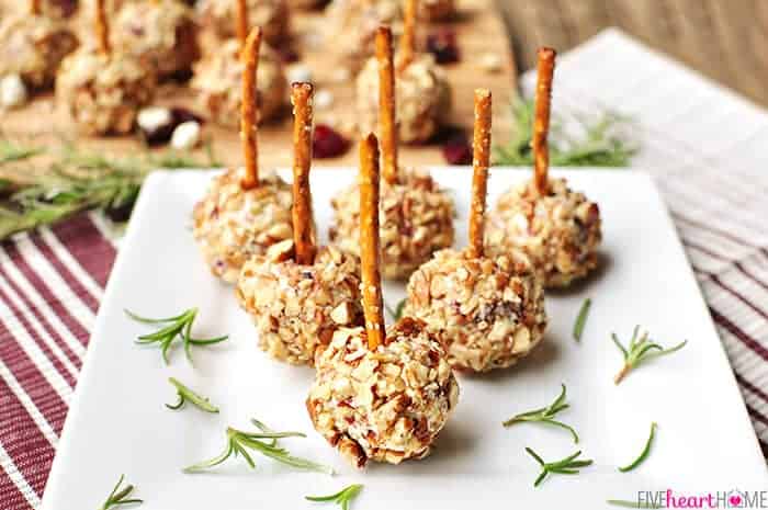 Find Nancy's Bite-sized cheese balls -- studded with dried cranberries and blue cheese crumbles -- are rolled in toasted pecans and skewered with pretzel sticks for fun, easy appetizers!