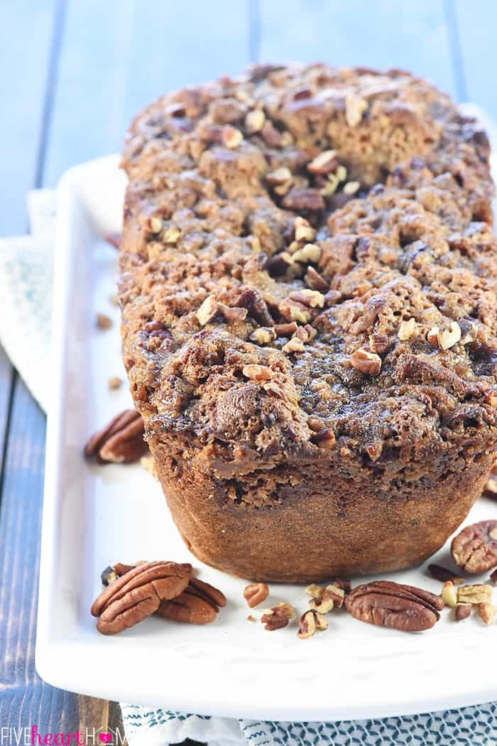 Loaf of Pecan Bread on white platter.