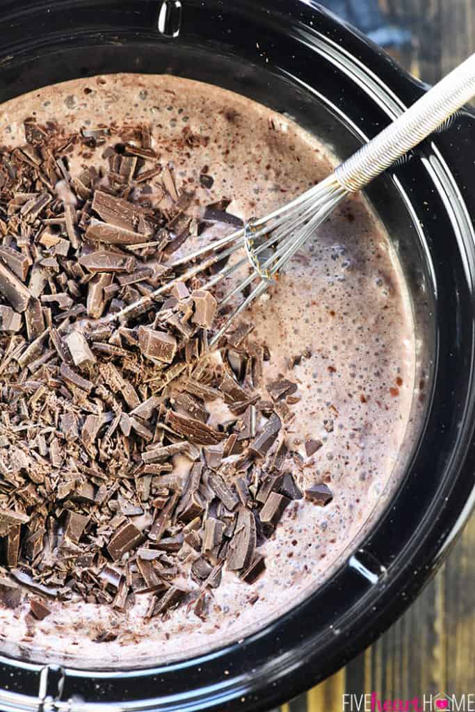Whisking chocolate into Crockpot Hot Chocolate recipe.